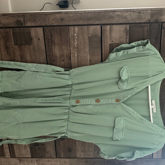 Cute sage greenish colored romper, photos are in different lighting. - Picture 1 of 5